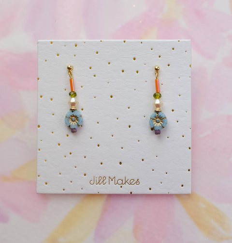 Light blue flower dangle earrings